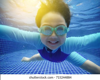 13,216 Asian boy swimming Images, Stock Photos & Vectors | Shutterstock