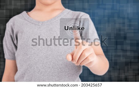 boy pressing unlike button