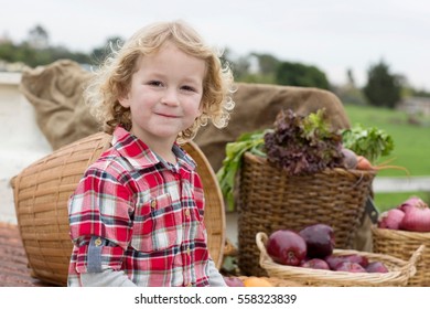 Boy With Produce In Truck Bed