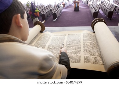 Boy Reading From The Torah