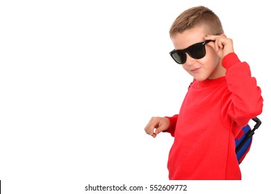 Boy in a red jacket with sunglasses with a backpack on his shoulder - Powered by Shutterstock