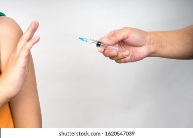 Boy refuse nurse injection or vaccination.  - Shutterstock ID 1620547039