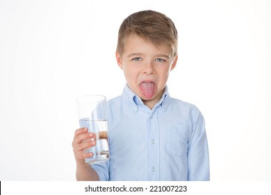 boy refusing to drink water
