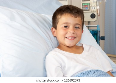 Boy Relaxing In Hospital Bed