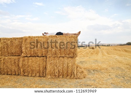 Similar – Vater und Sohn auf dem Feld liegend