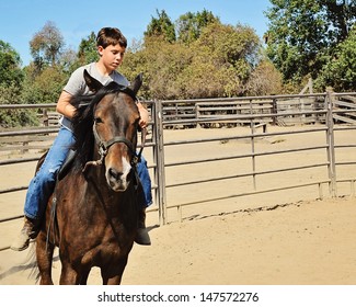 Boy Riding Horse Bareback