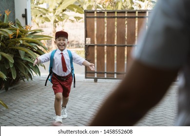 Boy With School Uniform Getting Excited When Coming Back Home After School