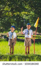 Boy Scout Making An Oath At The Forest.