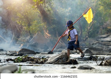 Boy Scouts Are Walking Across The River.