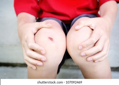 Boy With A Scraped Knee