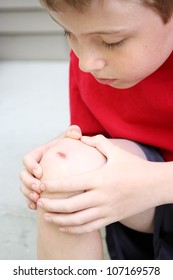 Boy With A Scraped Knee