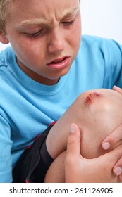 Boy With Scraped Knee