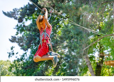 Boy Scream And Fast Slide Zip Line With Trolley