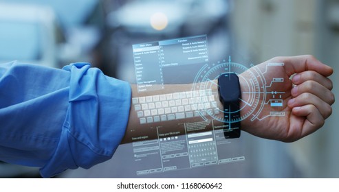 A boy sent message and see the social network with his hologram clock futuristic and very technologic. Concept: network, connection, technology, augmented reality and future