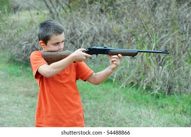 Boy Shooting Rifle Stock Photo 54488866 | Shutterstock