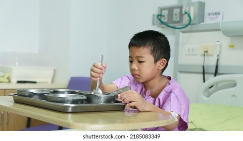 The Boy Was Sick With A Fever Causing Him To Lose His Appetite. Under The Concept Of Health Care , Focus On The Face