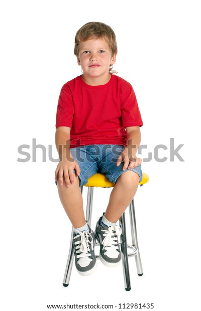 Boy Sitting On Stool Isolated On Stock Photo (Edit Now) 112981435