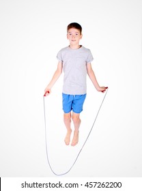 Boy With Skipping Rope Over White Background