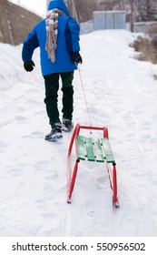 Boy with sled