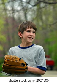 Boy Smiling Getting Ready To Practice Pitching