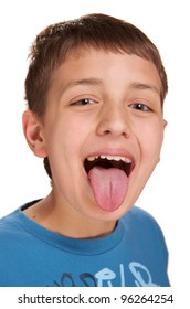 Boy sticking out his tongue on a white background