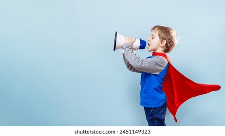 Boy in Superhero Cape with Megaphone - Powered by Shutterstock