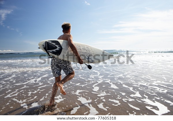 Boy Surfing Stock Photo 77605318 | Shutterstock