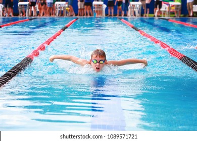 Boy swimming butterfly 