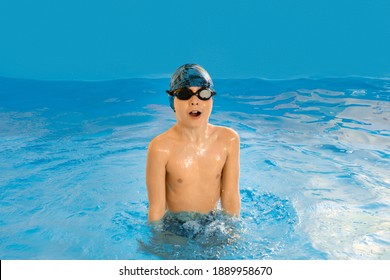 Boy Swimming In Indoor Pool Having Fun During Swim Class