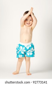 Boy In Swimming Trunks