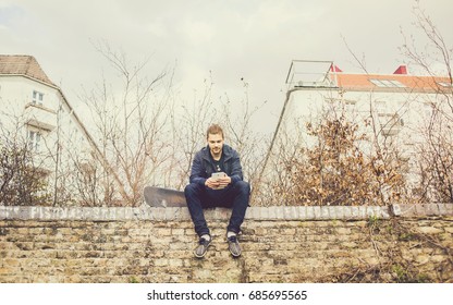 Boy & Tablet on a Wall
