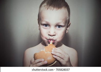 The boy takes a bite of a hamburger and knocks. Vintage family composition
