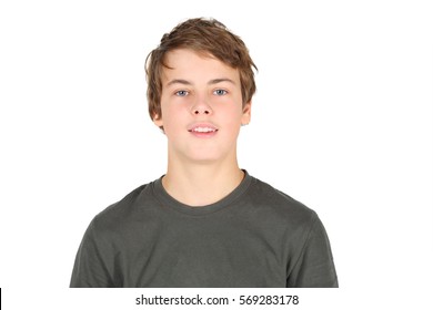 Boy teenager in grey t-shirt smiles isolated on white background