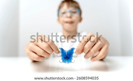 Boy with Teeth Bite Alignment Plate