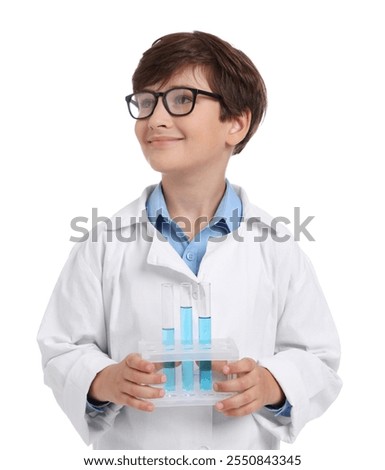 Boy with test tubes pretending to be scientist on white background. Dreaming of future profession