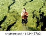 Boy Throwing water