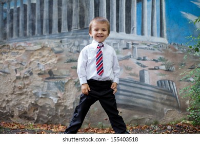 Boy with a tie, posing