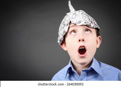 Boy In A Tin Foil Hat Looking Up