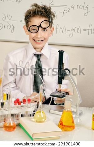 Similar – Image, Stock Photo Happy kig laughing and showing liquid in flask