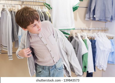 Boy Tries On Clothes Childrens Clothing Stock Photo 139843573 ...