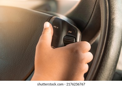 Boy Turning Up The Volume On His Father's Car Radio. Playing Driver In Daddy's Car. Traffic Concept