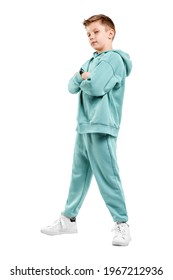 Boy In Turquoise Blue Tracksuit Isolated On White Background