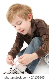 Boy Tying His Shoes