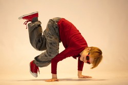 child in a hip hop dance pose, a Person Photo by Robert N - fotografie