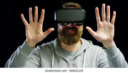 A boy uses the augmented reality interface traveling in 3D graphics. A virtual trip but real, innovative technology, Concept: technology, oculus, augmented reality and hologram.