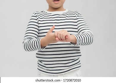 Boy Using Hand Sanitizer Gel To Clean His Hands. Hand Disinfection Concept.