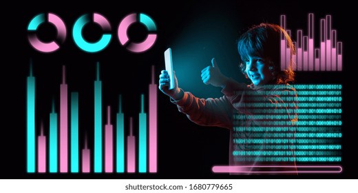 Boy using interface modern technology, digital layer panel and icons as economics learning concept. Analyzing situation with world's finance position while crisis and pandemic, business strategy.