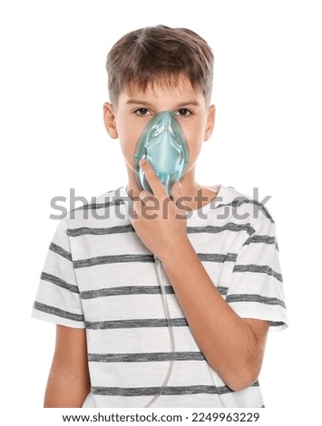 Cute preteen boy inhales the air of freedom from car window during family road trip and enjoy of pleasant expectation of happy vacation. Joyful child travel with parents