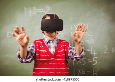 Boy using a virtual reality device at school - Powered by Shutterstock