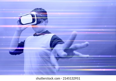 boy using virtual reality simulator headset on purple background